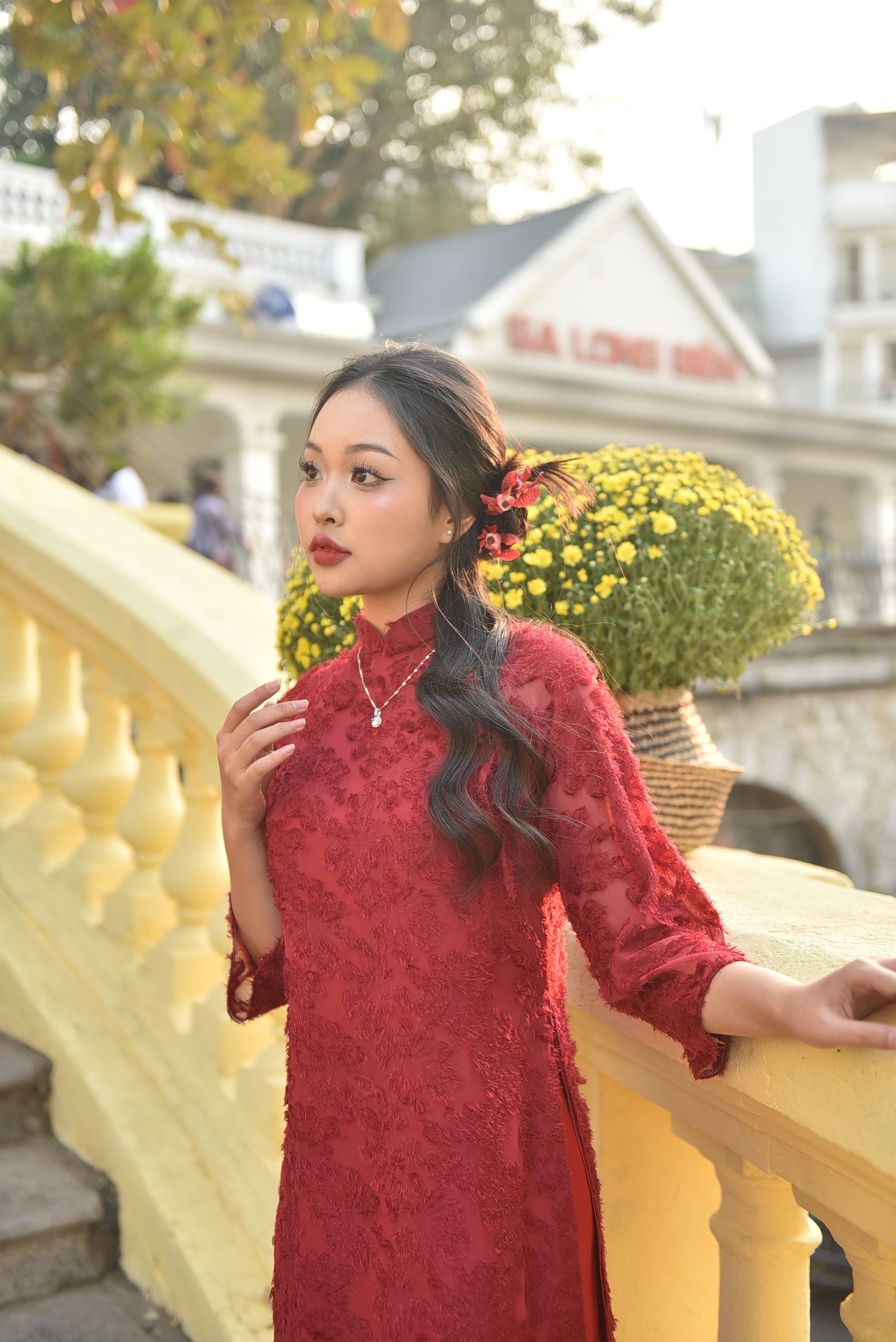 Elegant Woman in Red Dress Posing Outdoors · Free Stock Photo