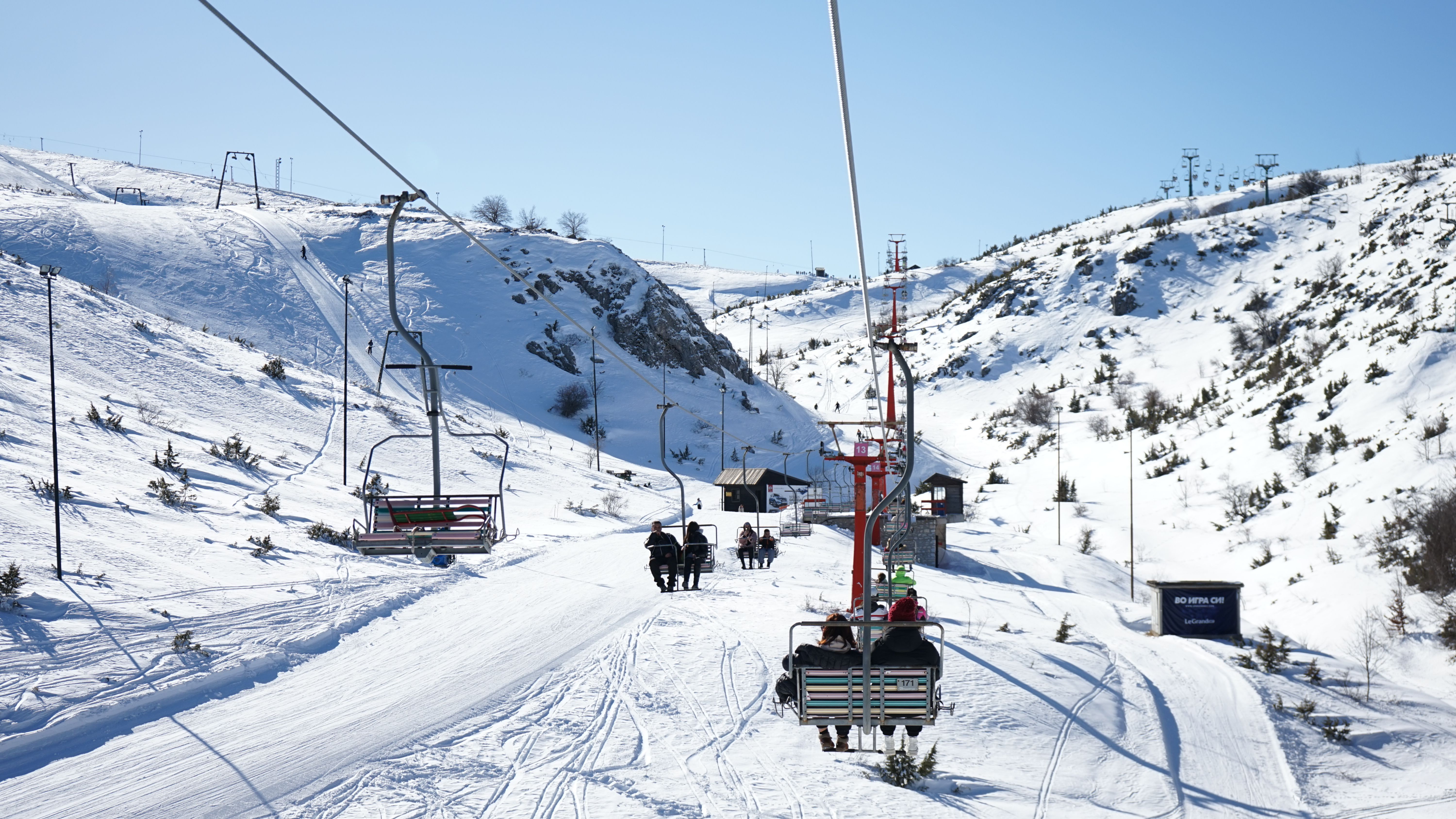 Snow-covered mountains with a ski lift in Mavrovo, North Macedonia. Perfect winter adventure.