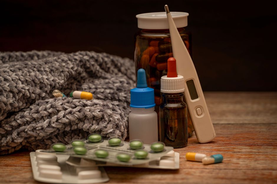 A collection of cold remedies and medications for relief during winter illness.