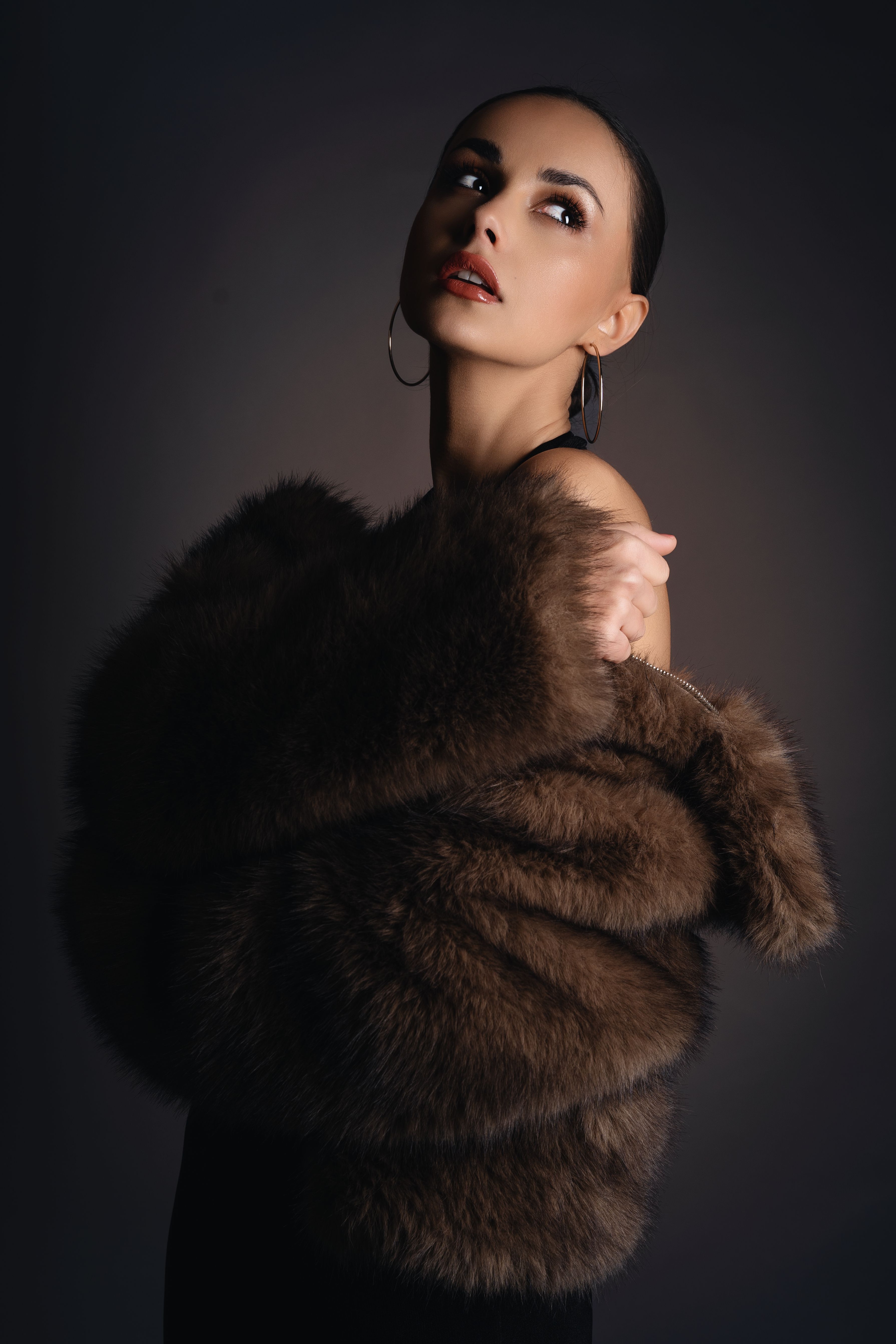 Elegant fashion portrait with fur coat