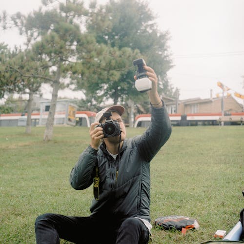 Základová fotografie zdarma na téma držení, focení, fotoaparát