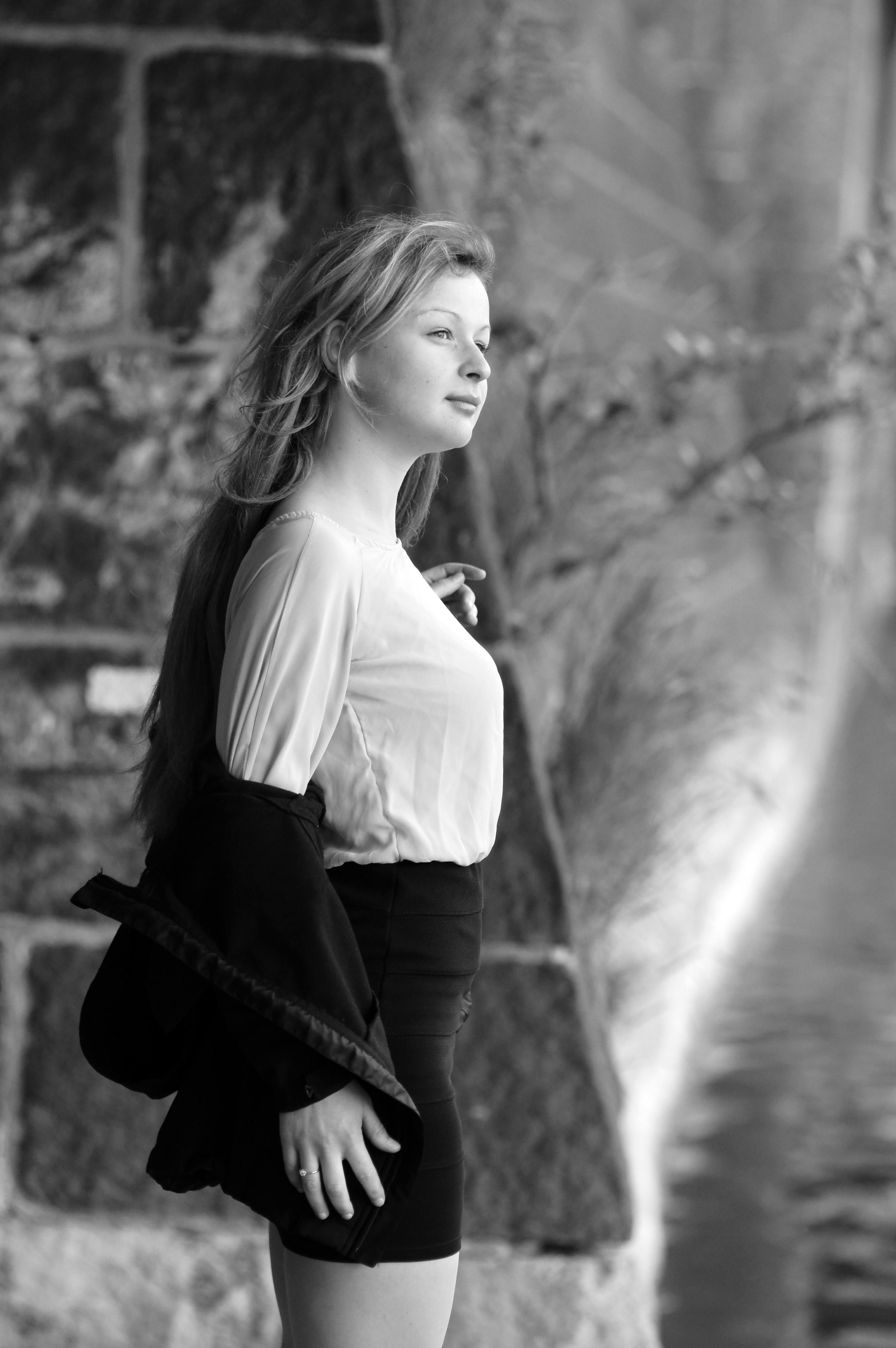 Elegant Black and White Portrait of Woman Outdoors · Free Stock Photo
