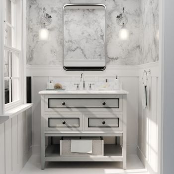 Minimalist bathroom with a marble accent wall and stylish vanity.