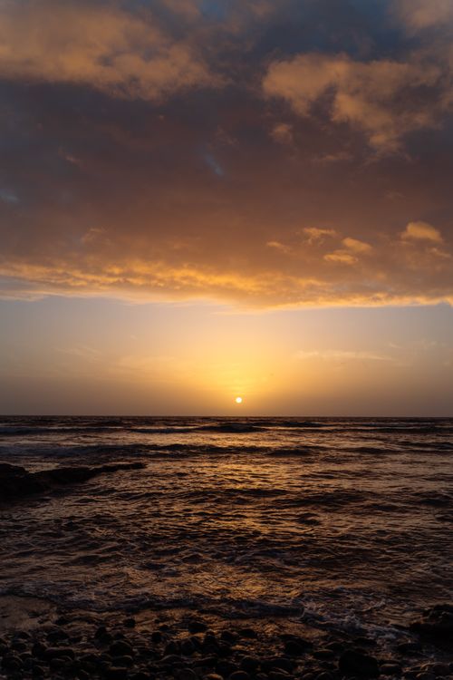 Free Breathtaking sunset view over Tenerife's serene oceanscape with golden reflections. Stock Photo