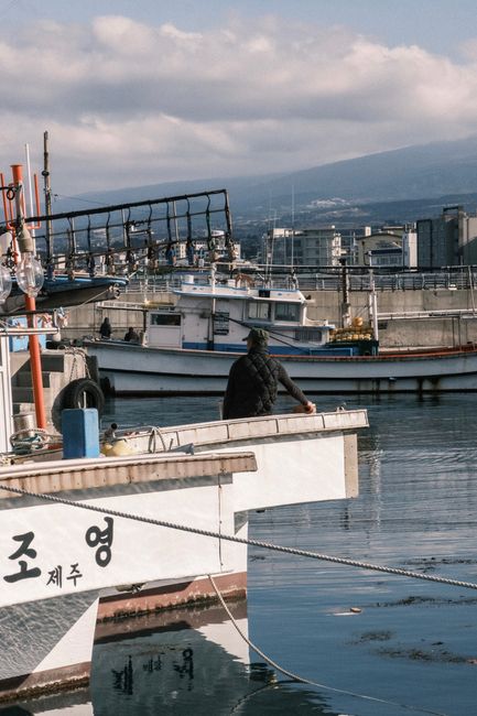 ferry boat at jeju harbor cloudy weather