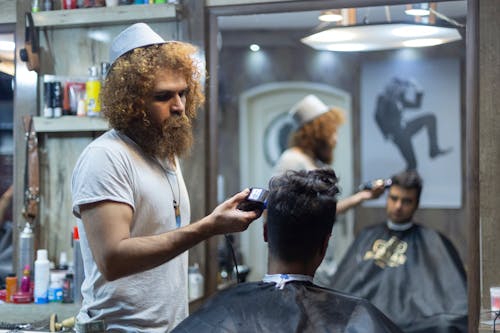 Man Holding Hair Clipper