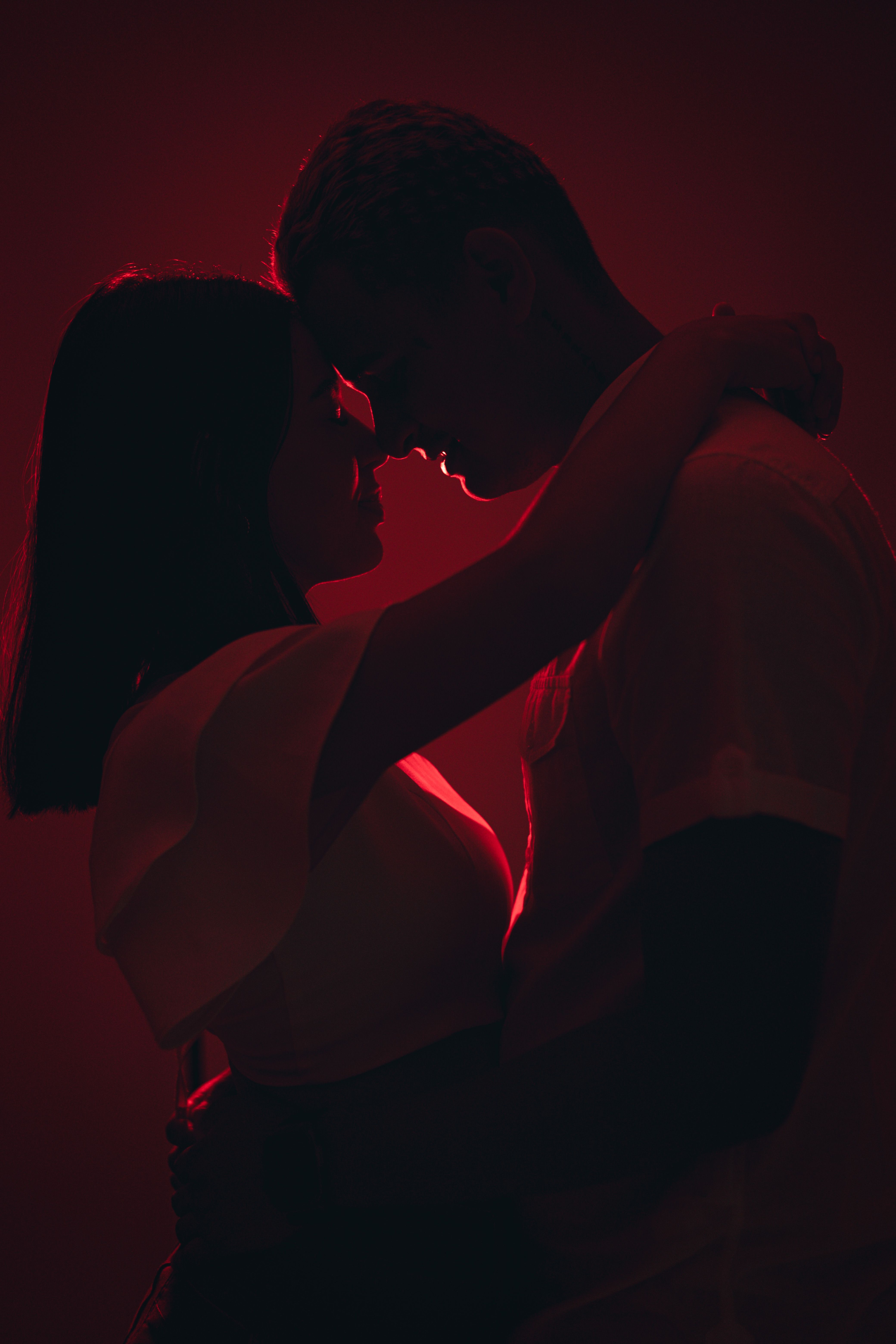 Couple sharing a tender embrace, falling in love