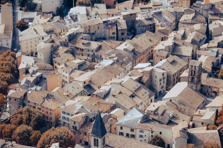 Capture the quaint architecture of Castellane, a picturesque village in Provence, France.