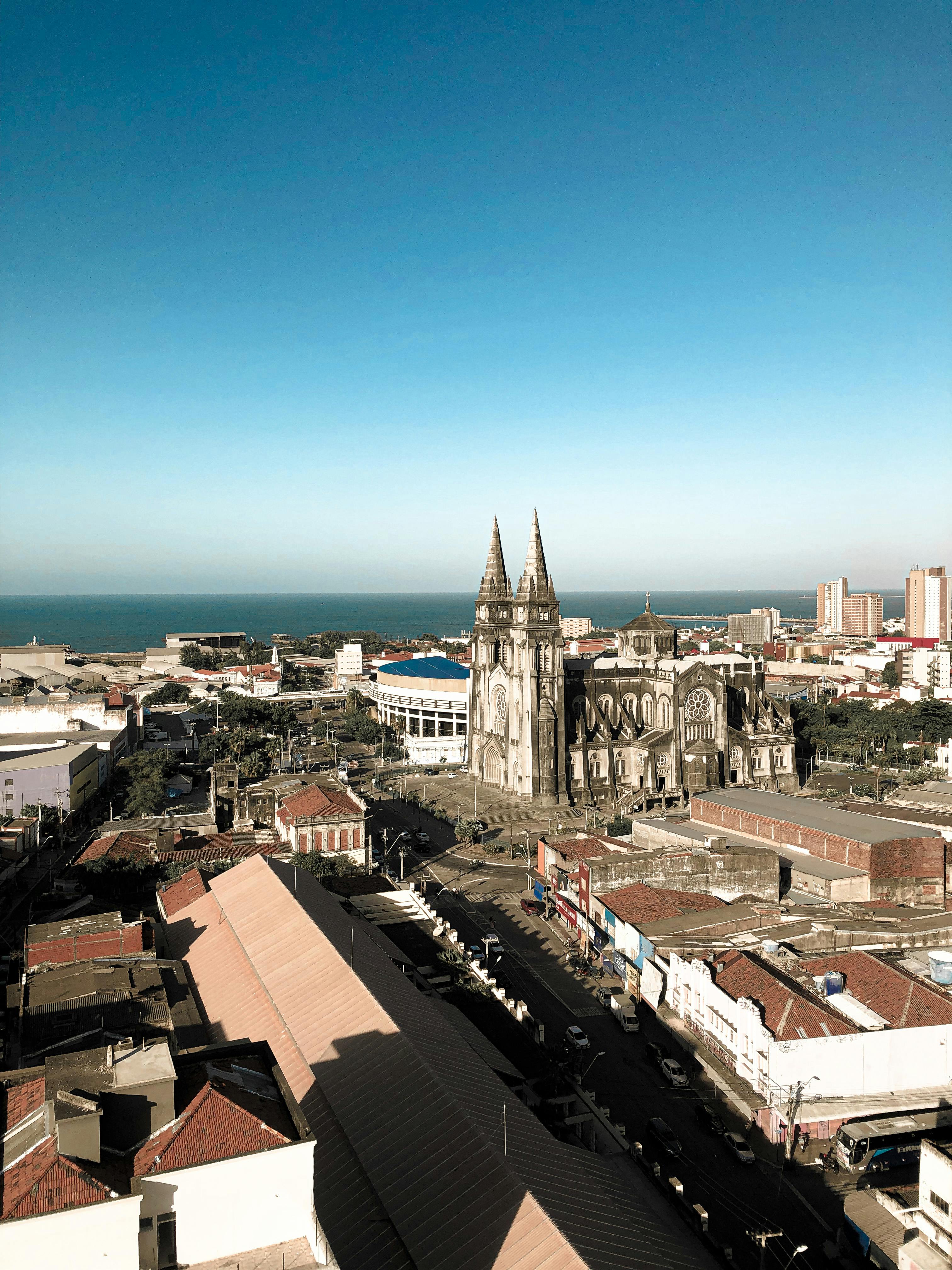 Aerial view of Fortaleza Cathedral with cityscape and ocean in the background, Brazil.
