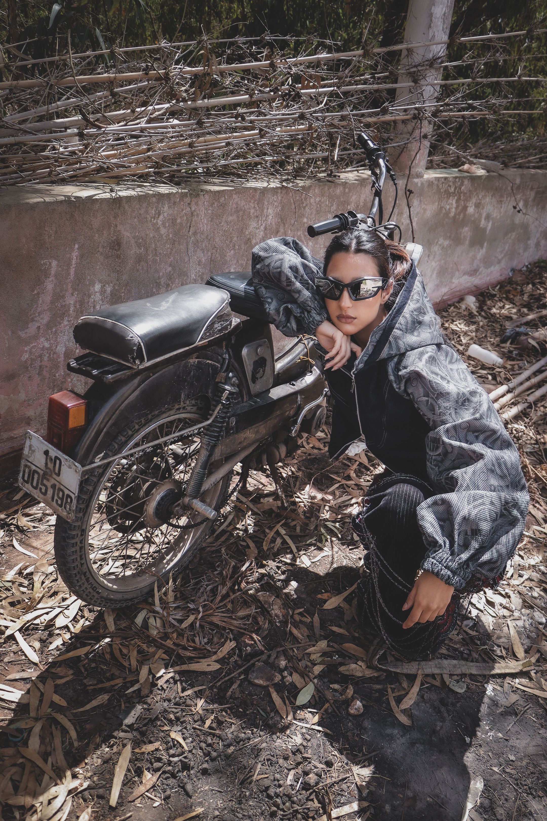 Stylish Model Posing with Vintage Motorcycle in Casablanca · Free Stock ...