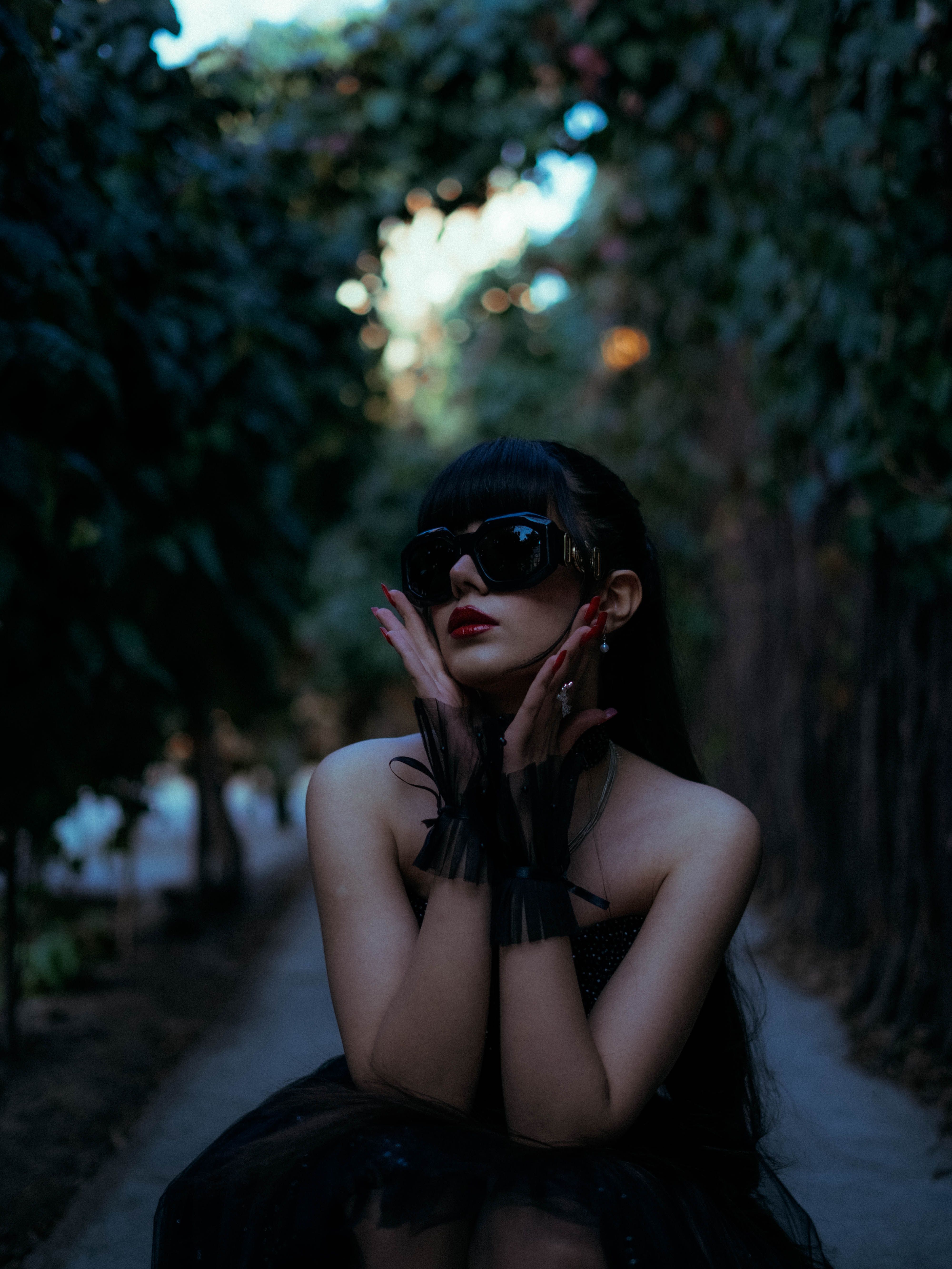 Fashionable Woman Posing in Mystical Forest Path · Free Stock Photo