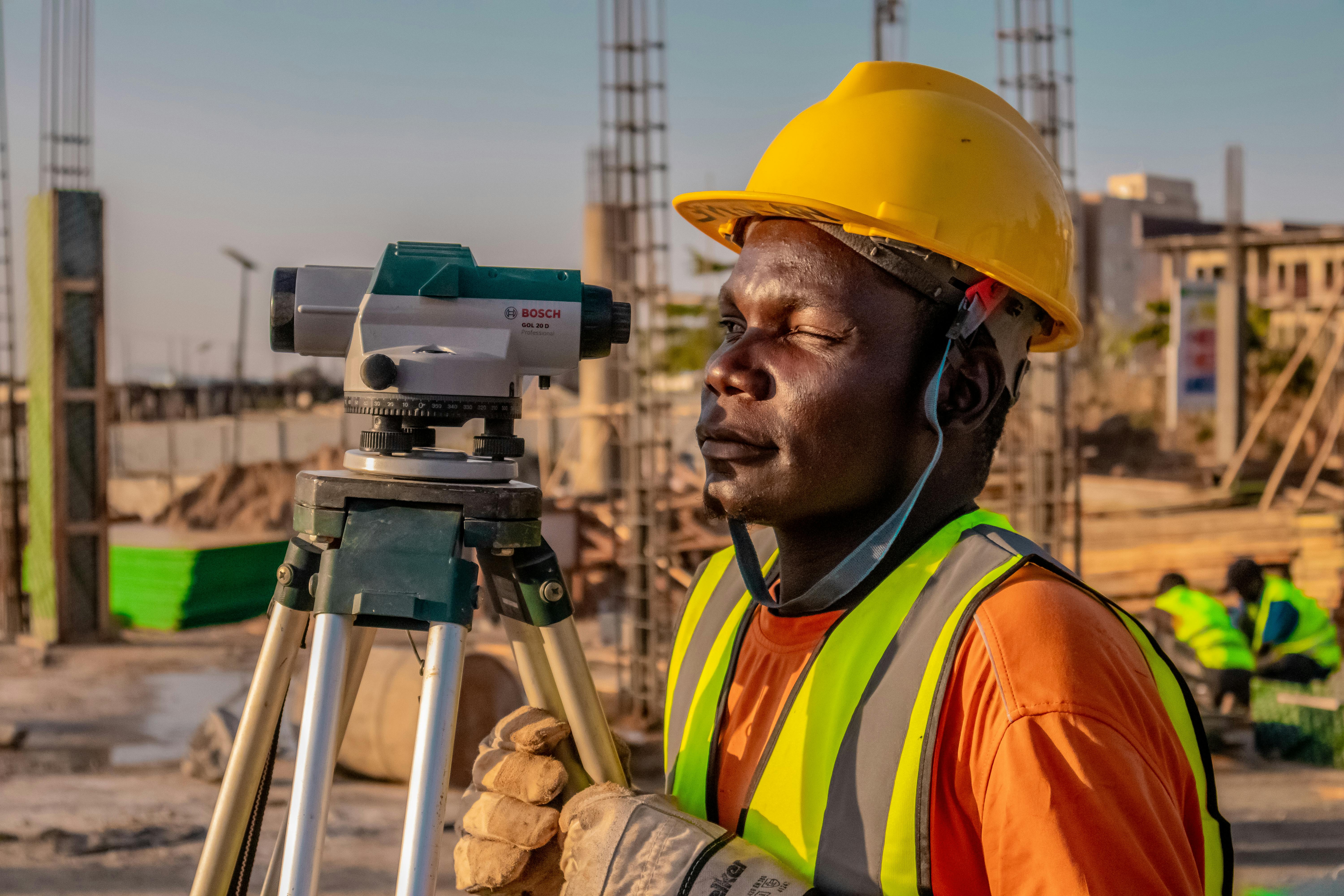 Image of a land surveyor using equipment on a property lot - cos value list