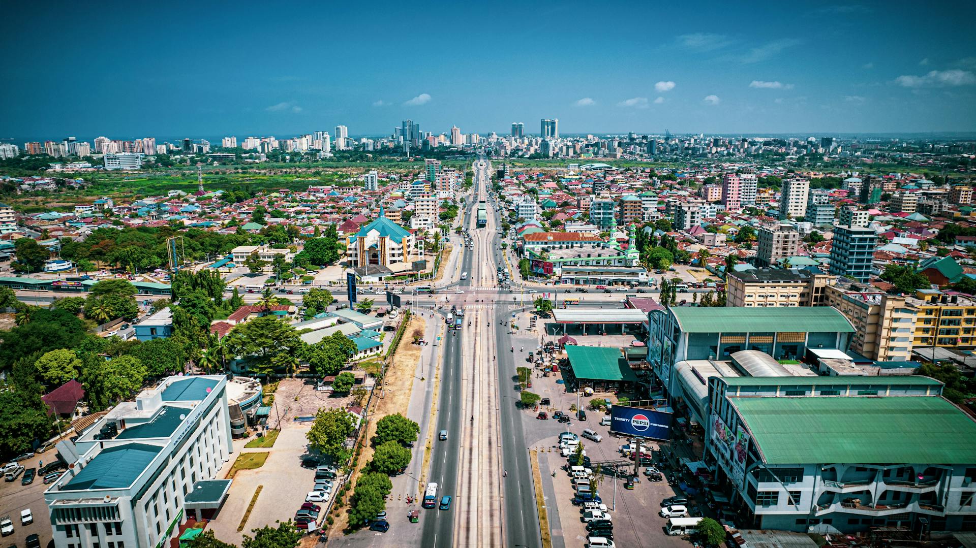 Stunning aerial view of bustling cityscape in Dar es Salaam, Tanzania, on a clear day.