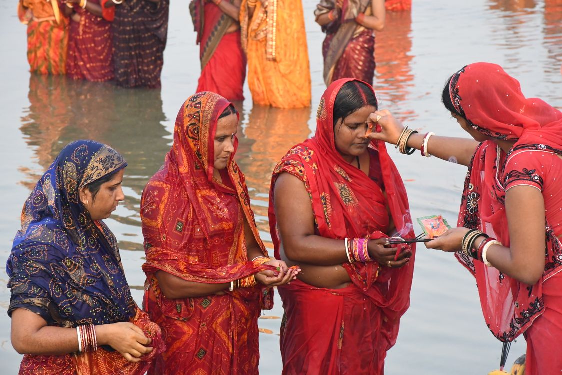 Woman Ritual Women Performing Traditional Ritual in Water · Free Stock Photo