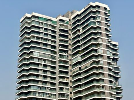 Striking architectural high-rise building captured on a clear day in Mumbai.