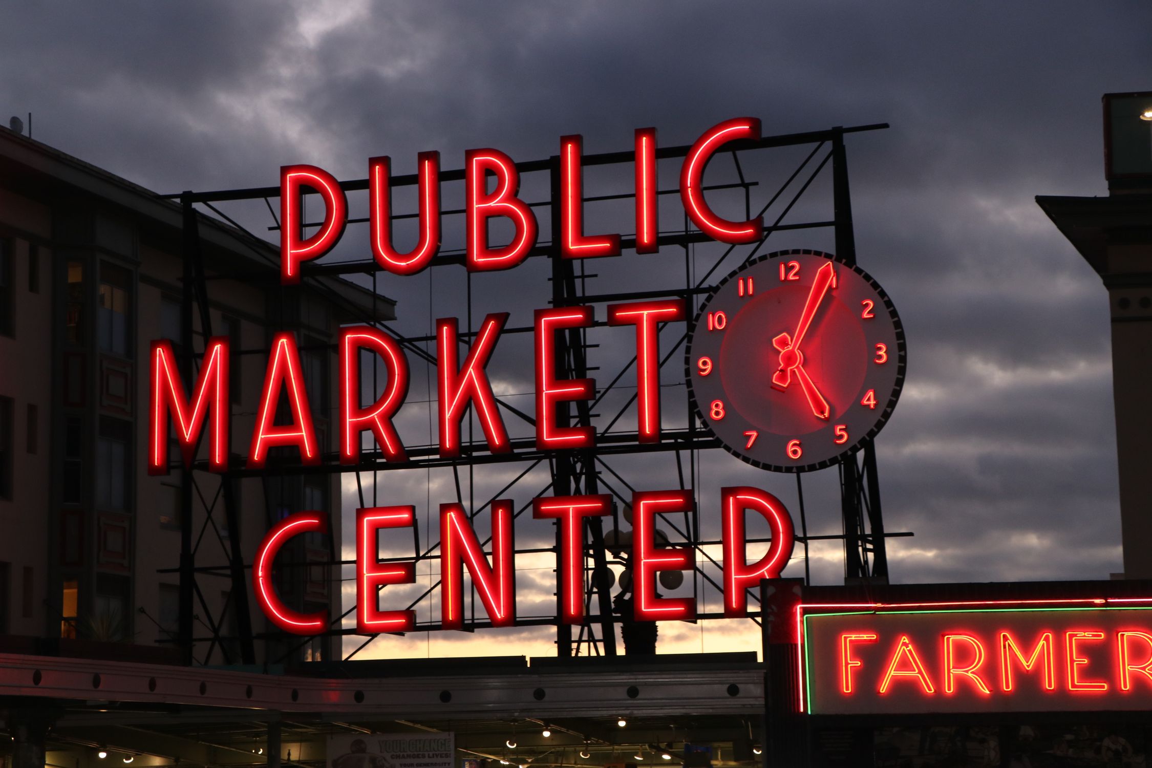 Iconic Pike Place Market Sign at Dusk in Seattle · Free Stock Photo