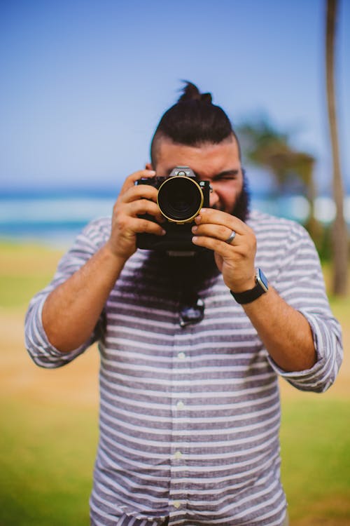 Free Man Wears Gray and White Striped Dress Shirt Stock Photo