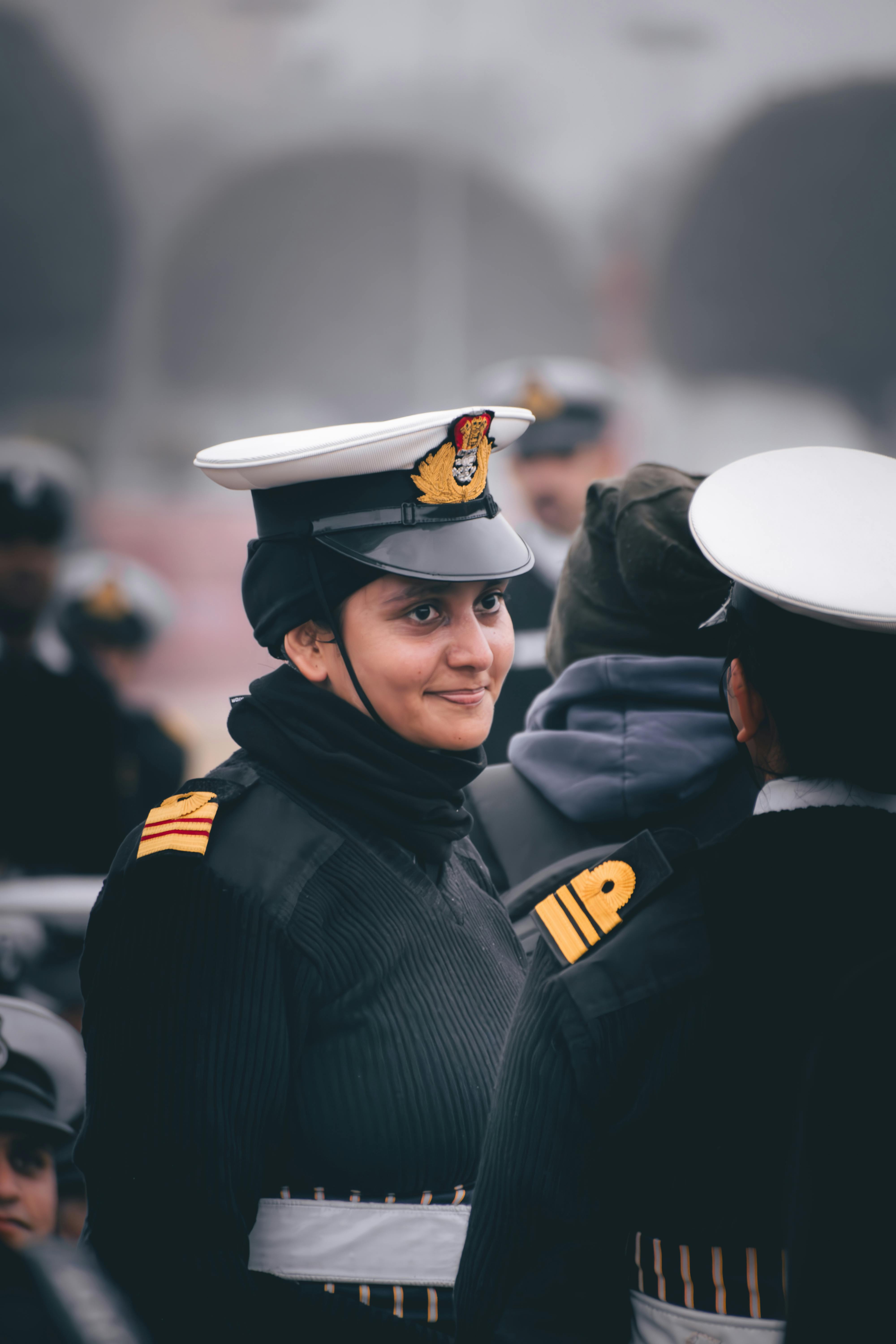 young navy officer in formal uniform at ceremony