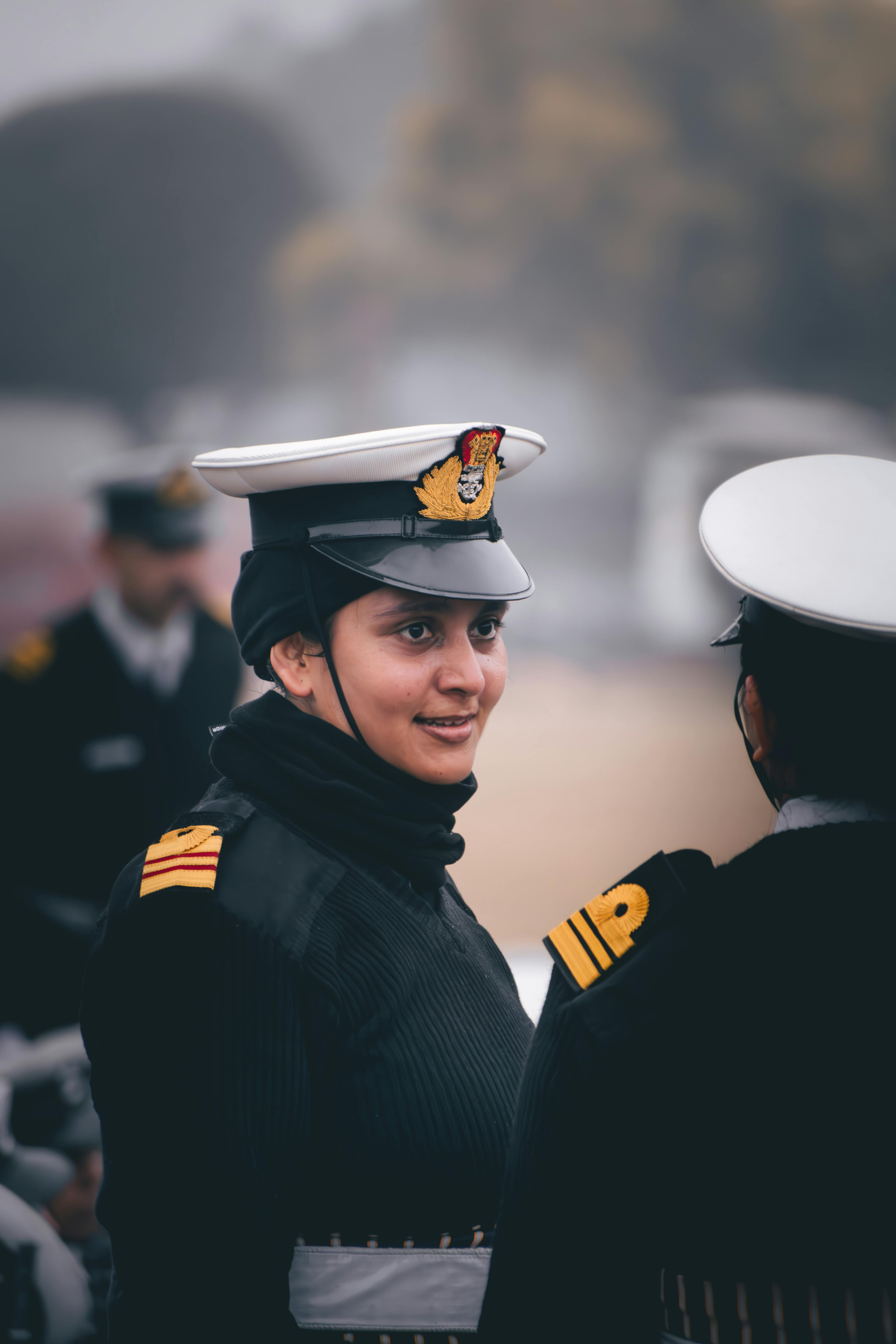 female naval officers in discussion outdoors