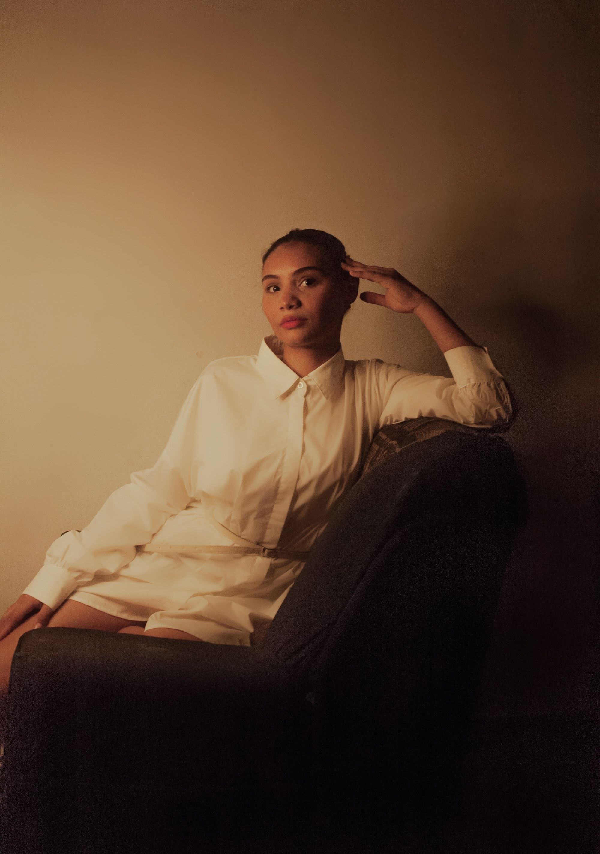 Elegant Portrait of Woman in Minimalist Setting · Free Stock Photo