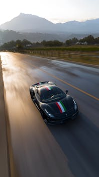 A sleek sportscar drives on a winding mountain road at dawn, showcasing speed and luxury.