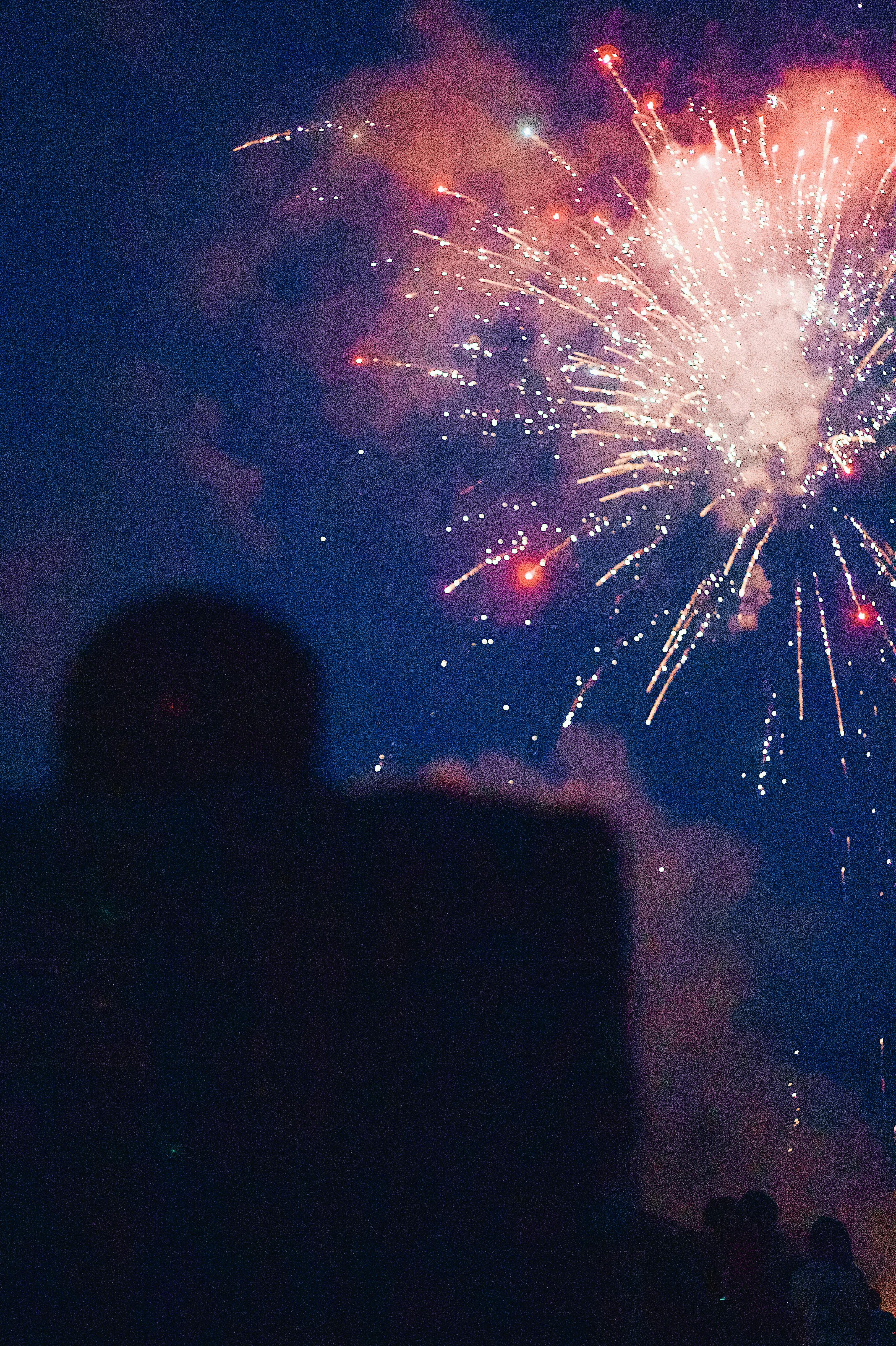 A colorful fireworks display illuminates the night sky at a community event in Clemson, South Carolina.