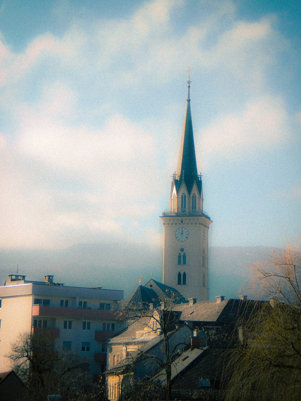 A dreamy retro view of the church tower in Villach, Carinthia, Austria with a vintage feel.