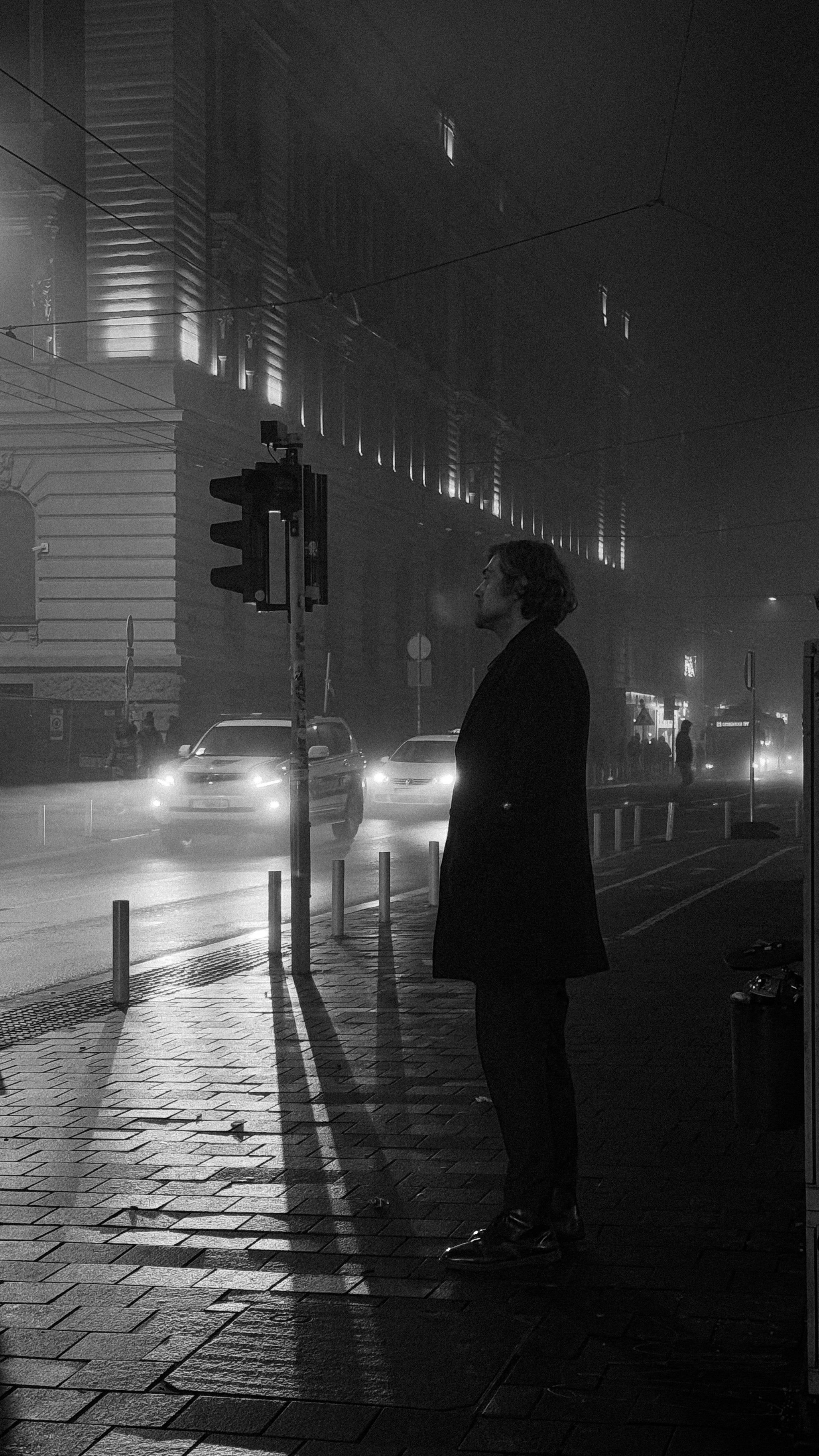 Man Standing on Foggy City Street at Night · Free Stock Photo