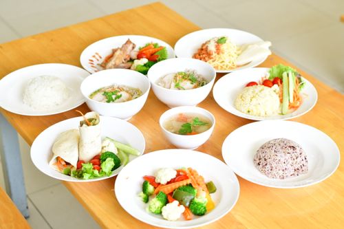Assorted healthy meals on a wooden table