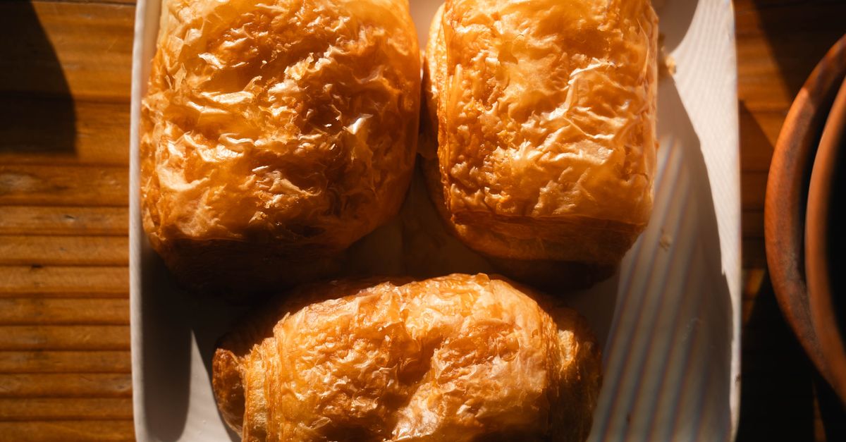 Golden Pastries In Sunlit Kitchen Free Stock Photo golden-pastries-in-sunlit-kitchen-free-stock-photo