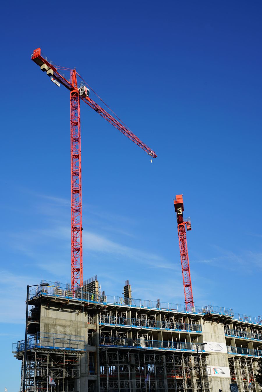 Tower cranes on a building site where BIM coordination prevents site clashes