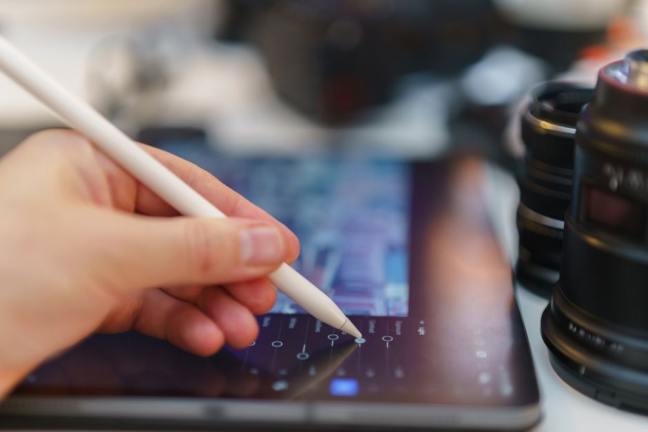 How Cuisinart 14 Cup and Breville Sous Chef Cut Meal Prep Time Close-up of digital design work using a tablet and stylus, showcasing creativity and technology in action.