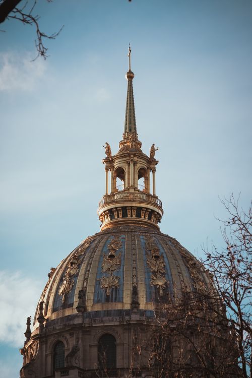 Free Elegant view of the Les Invalides dome in Paris against a winter sky. Stock Photo