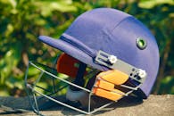 Close-up of a Blue Cricket Helmet Outdoors