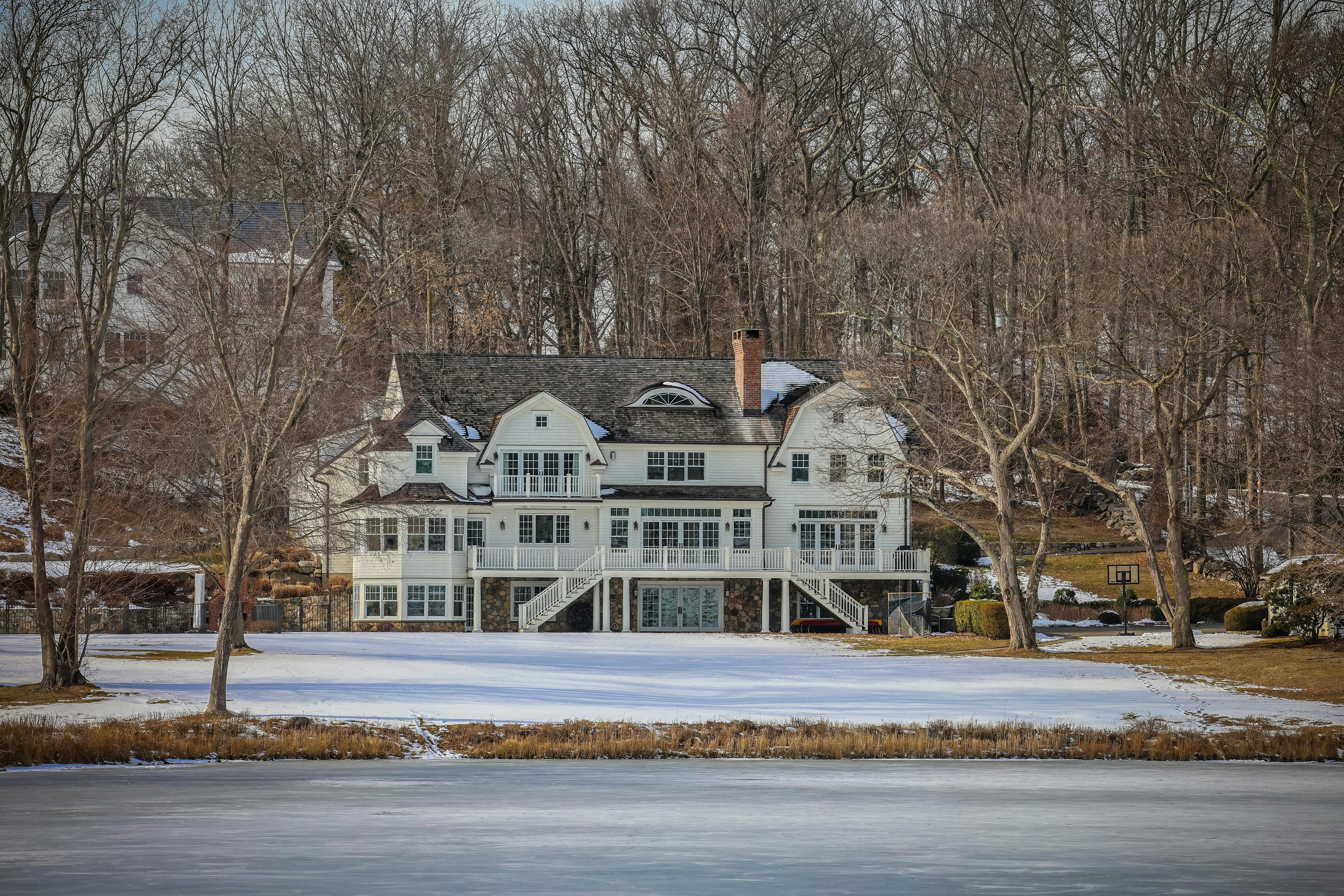 Beautiful winter view of a waterfront estate in Darien, Connecticut.