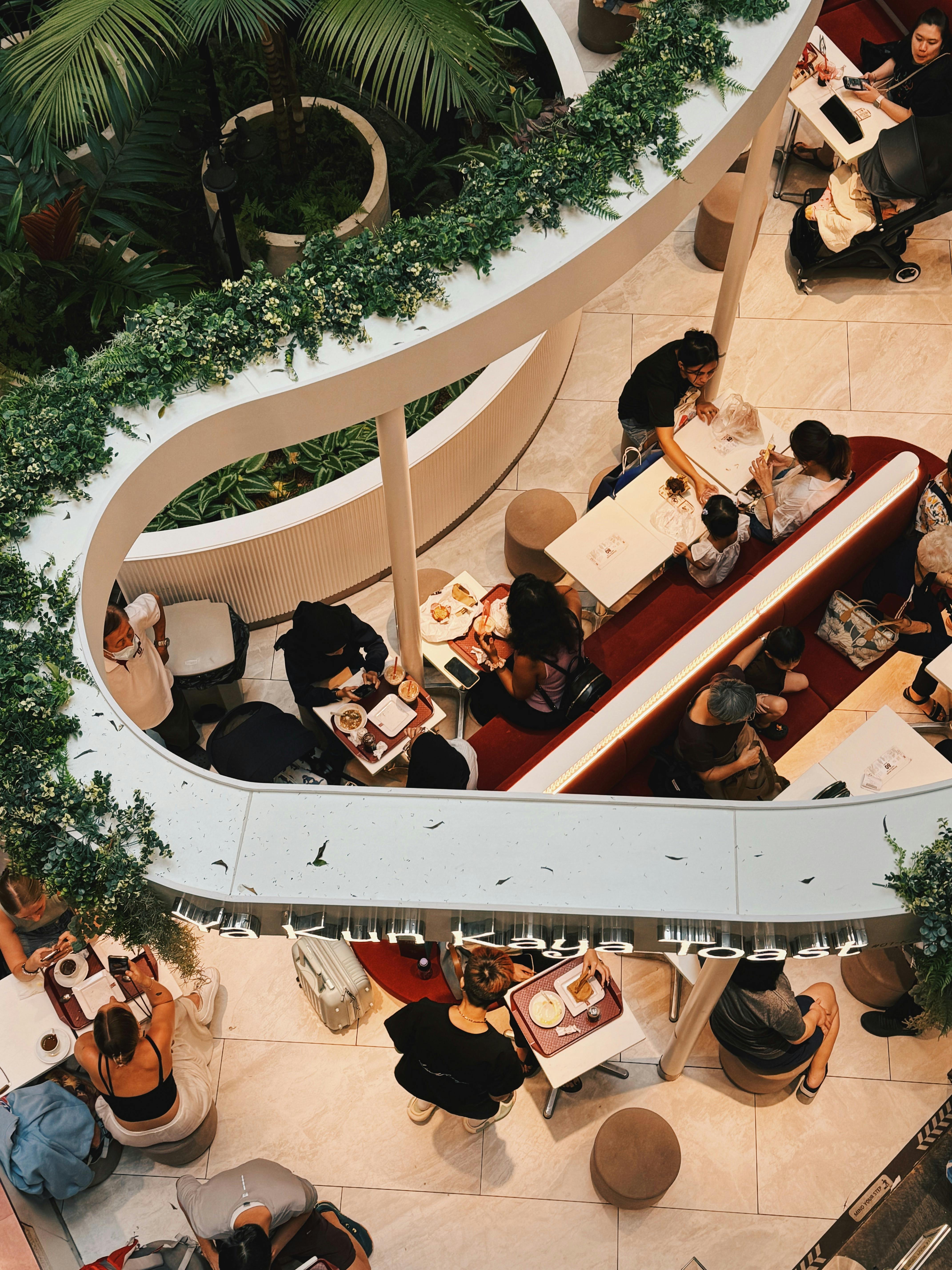 Food court with diverse dining options and communal seating