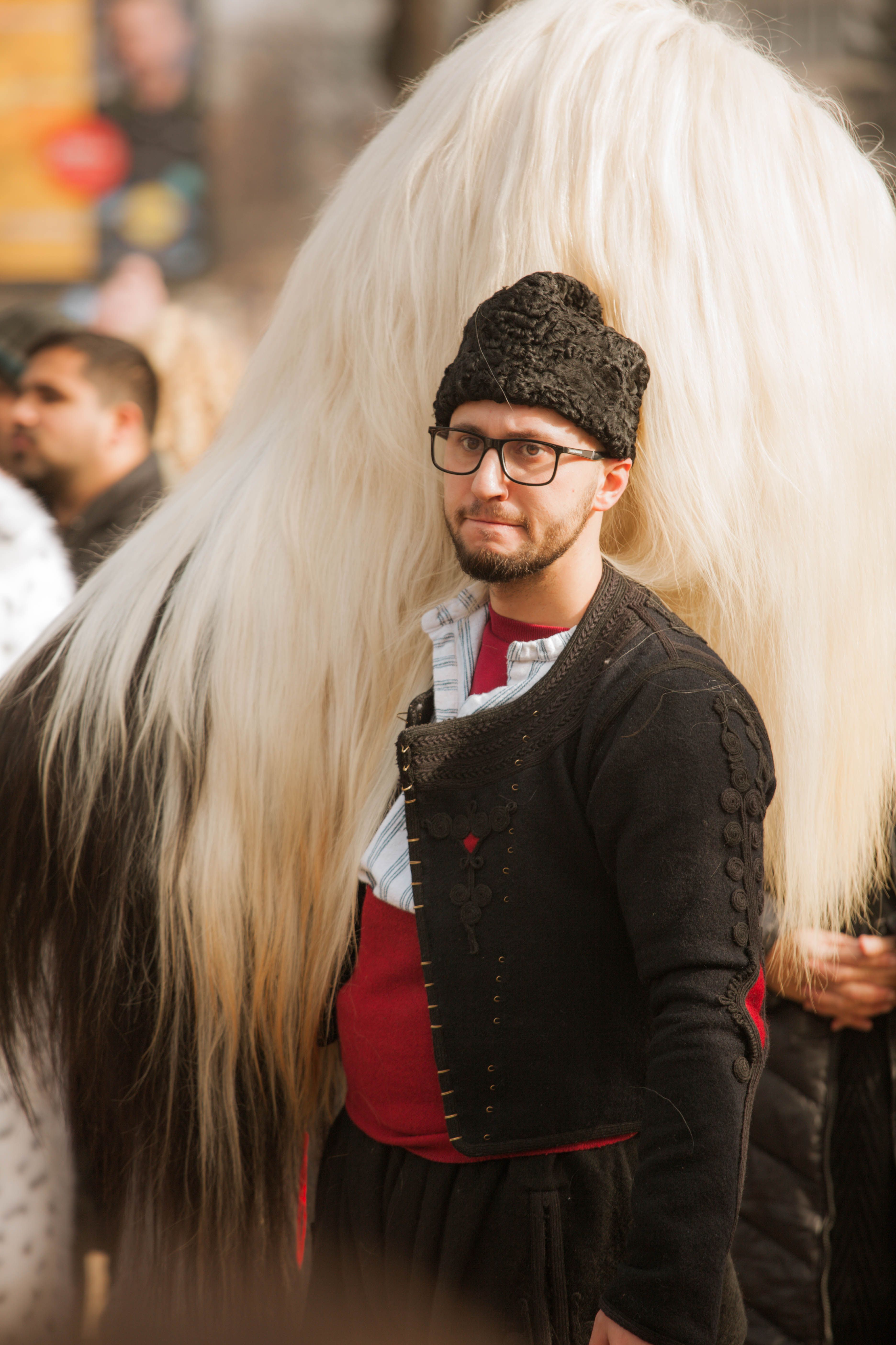 Man in traditional costume at the Surva Festival in Pernik, Bulgaria.