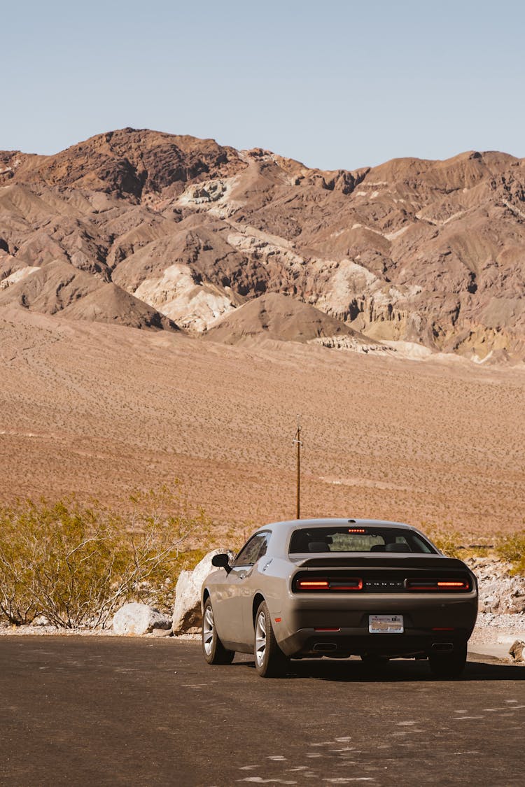 Gray Coupe On Road