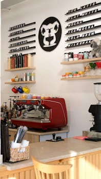 Bright and cozy coffee shop interior in Istanbul with a red espresso machine.