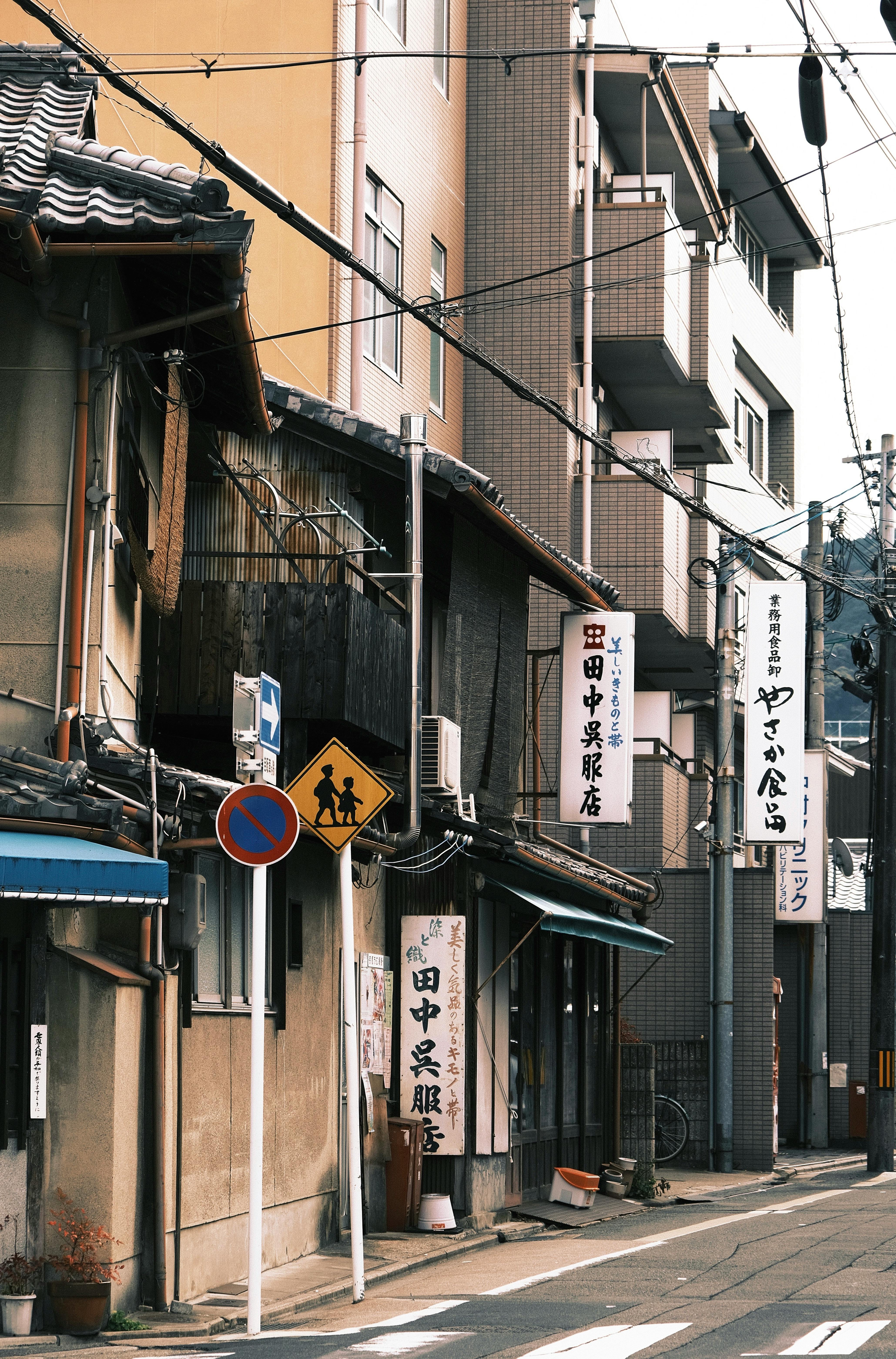 Authentic street scene featuring traditional Japanese architecture in an urban setting.