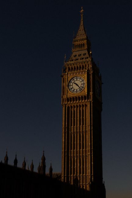 Big Ben illuminated at night, symbolizing historical and architectural beauty in London.