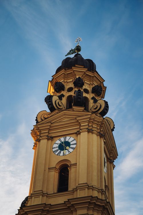 Free Stunning view of the Theatine Church tower in Munich, Bavaria, during sunset with intricate architecture. Stock Photo