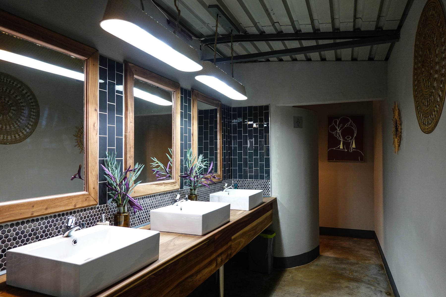 Contemporary double vanity with coordinated mirrors, lighting and storage