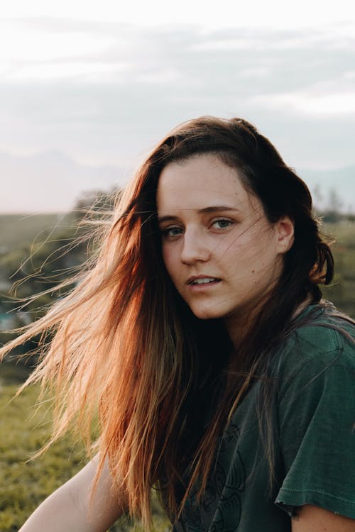 Portrait Photo of Woman in Green T-shirt Posing