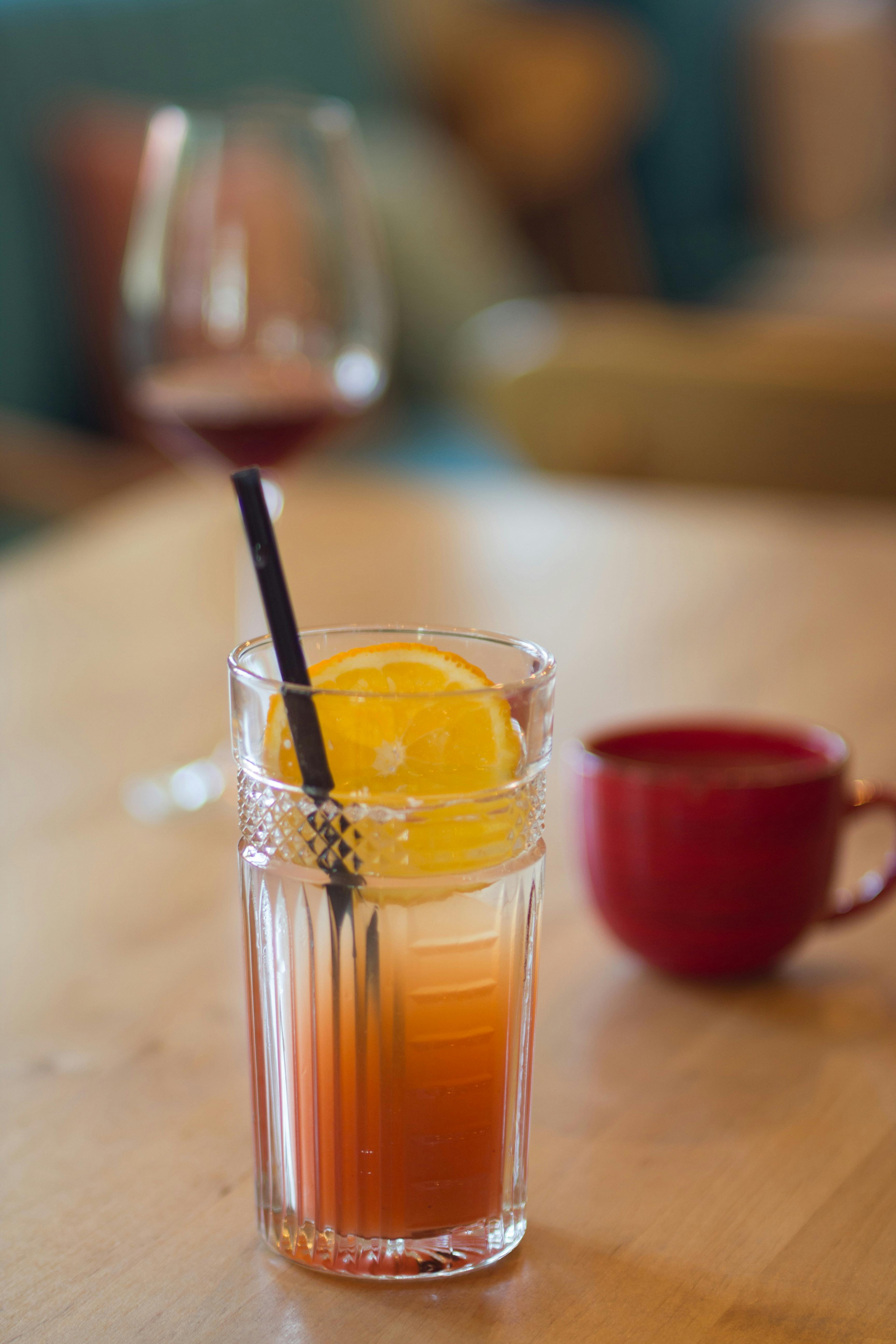 Filled Juice With Slice Of Orange · Free Stock Photo