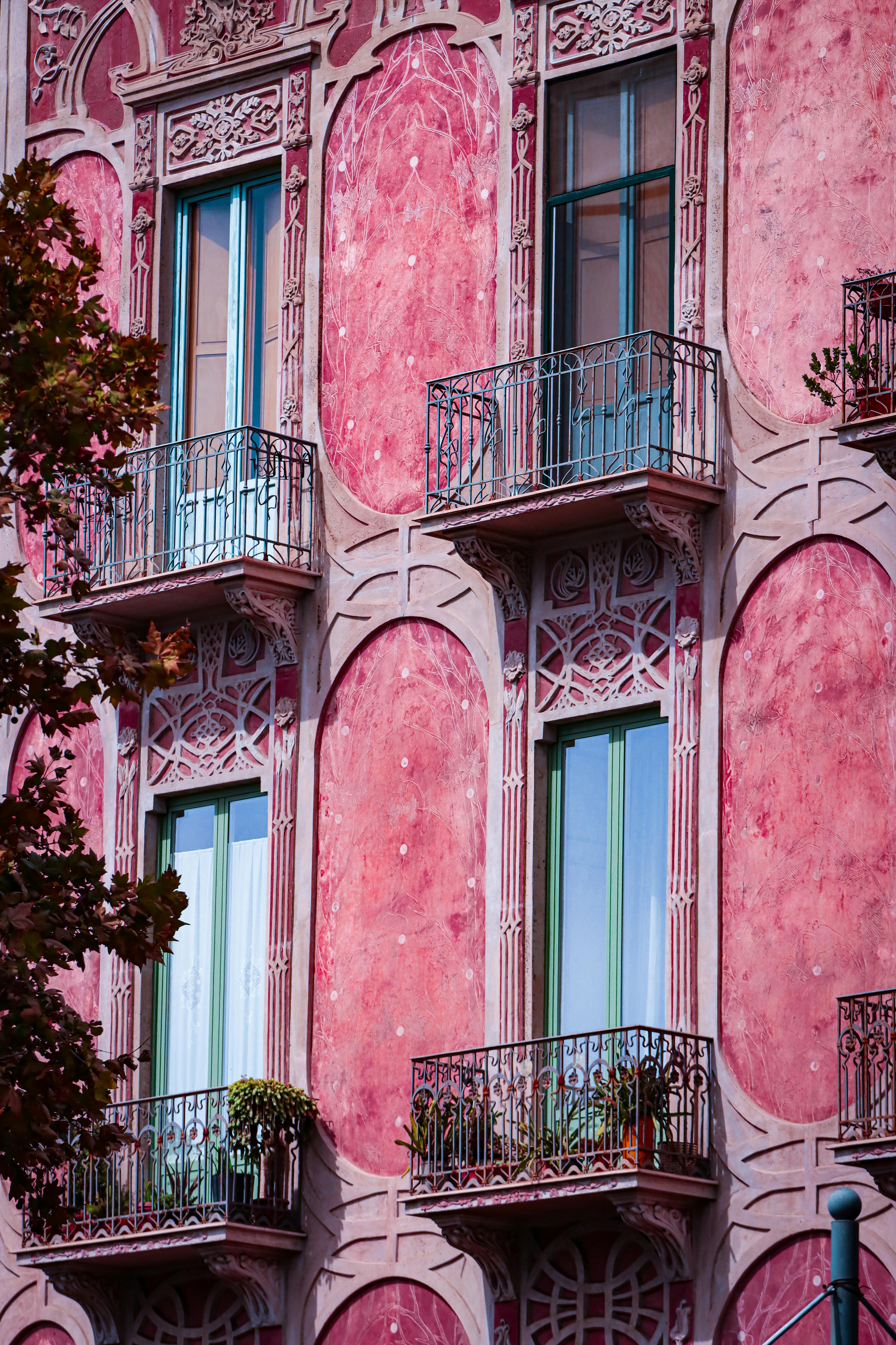 elegant italian facade with vintage balconies