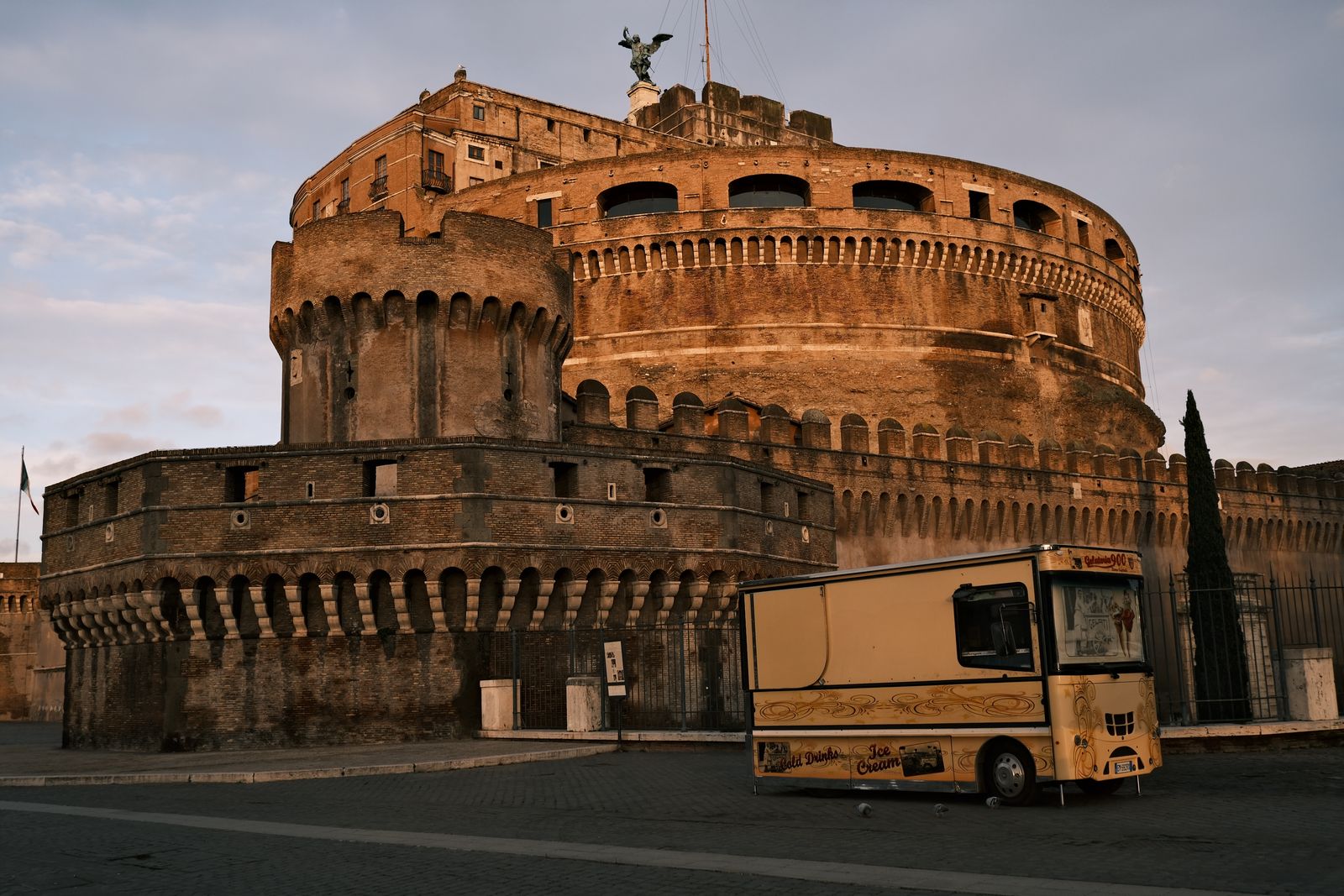 Castel Sant'Angelo's circular fortress walls beside the Tiber river in Rome