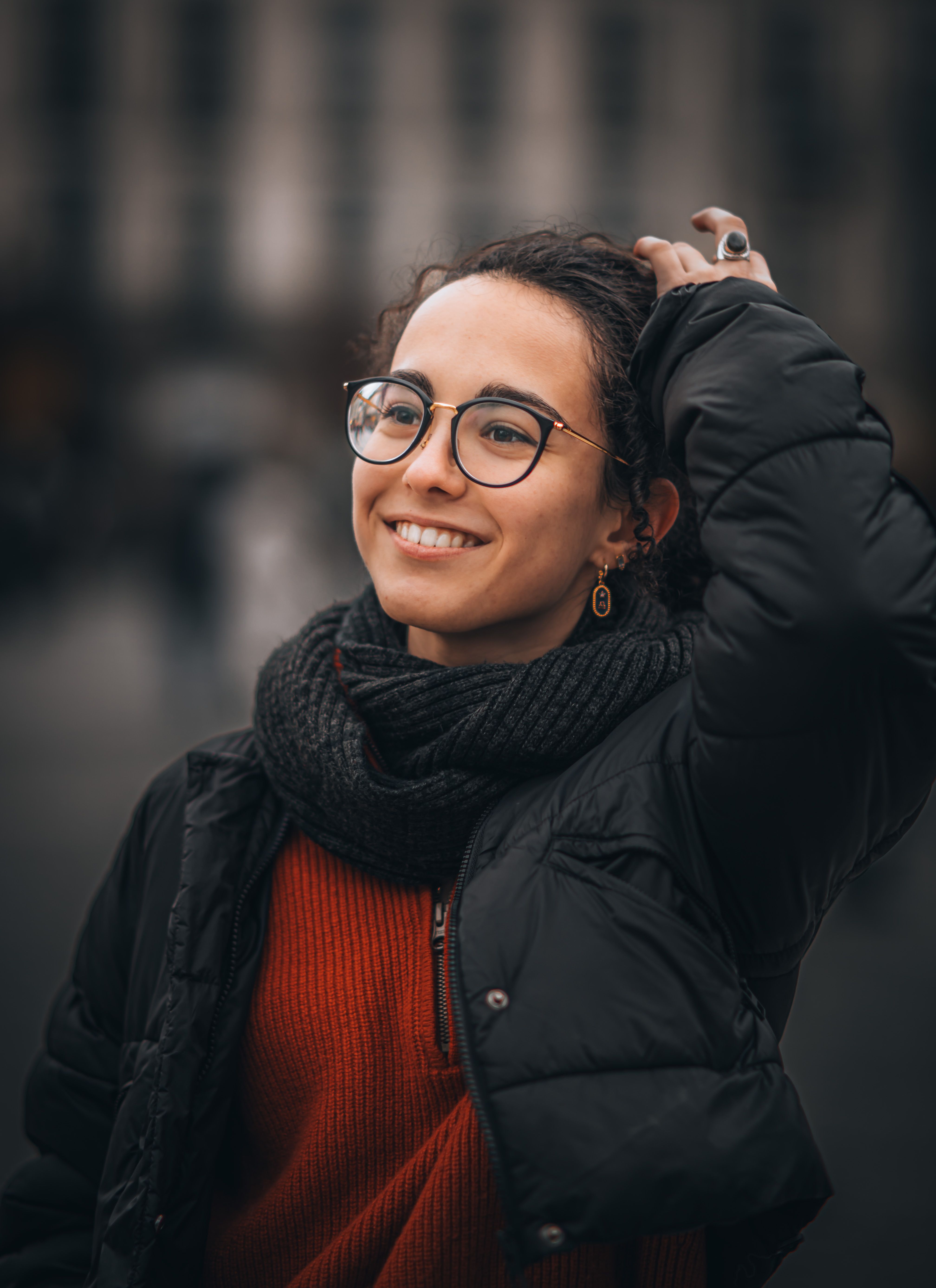 Woman Smiling Outdoors in Autumn · Free Stock Photo