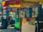 Vibrant Indian Street Food Stall with Colorful Banners