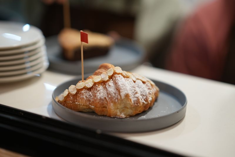 Flaky almond croissant from Best Bakery 2026